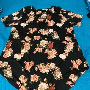 LuLaRoe blouse Size Large black and floral 95% polyester and 5% spandex